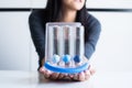 Woman hand holding incentivespirometer or three balls for stimulate lung Royalty Free Stock Photo