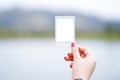 Woman hand holding Instant photo frame.