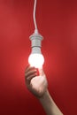 Woman hand holding light bulb, concept of ideas with innovation Royalty Free Stock Photo