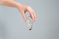 Woman hand holding light bulb. Idea and busines concept Royalty Free Stock Photo