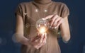 Woman hand holding light bulbs with brain inside. Creative and innovation inspiration. Business Bright idea concept Royalty Free Stock Photo