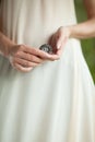 Woman hand holding little fossile ammonite, sensual studio shot with soft light Royalty Free Stock Photo