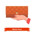 Woman hand holding luxury leather purse