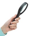 Woman hand holding magnifying glass Royalty Free Stock Photo