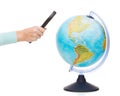 Woman hand holding magnifying glass over globe Royalty Free Stock Photo