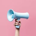 woman hand holding a megaphone Royalty Free Stock Photo