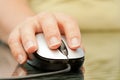 Woman hand holding mouse Royalty Free Stock Photo
