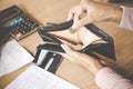 Woman hand holding one coin bankrupt broke after credit card payday Royalty Free Stock Photo