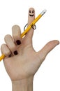 Woman hand holding pencil with funny stickman drawn on it