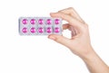 Woman hand holding pills tablet Royalty Free Stock Photo