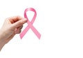 Woman hand holding pink ribbon for breast cancer awareness Royalty Free Stock Photo