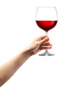 Woman hand holding red wine glass isolated on white Royalty Free Stock Photo