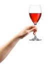 Woman hand holding red wine glass isolated on white Royalty Free Stock Photo