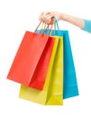 Woman hand holding shopping bags Royalty Free Stock Photo