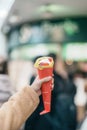 Woman hand holding Strawberry Crepes. Popular dessert pancakes in Japan