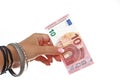Woman hand holding ten euro european money bill on isolated white cutout background. Studio photo with studio lighting Royalty Free Stock Photo