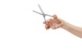 Woman hand is holding thinning scissors