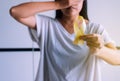 Woman hand holding yellow ribbon on white background,Suicide prevention,Cancer disease awareness concept Royalty Free Stock Photo