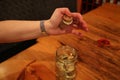 Woman hand jar full of coins