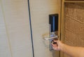 woman hand lock the entrance hotel room for safety