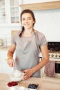 Woman Hand Mixed Batter on Clear Bowl with Baloon Whisk Step by Step Baking Preparation in the Kitchen Royalty Free Stock Photo