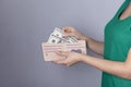 Woman hand money with wallet Royalty Free Stock Photo