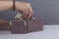 Woman hand money with wallet Royalty Free Stock Photo