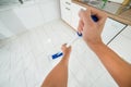 Woman Hand Mopping The Floor In Kitchen Royalty Free Stock Photo