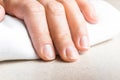 Woman hand with natural unpainted fingernails