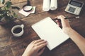 Woman hand notepad and stationary on table