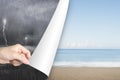 Woman hand open calm beach page replace stormy ocean Royalty Free Stock Photo