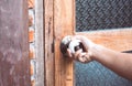 Woman hand opening/closing door knob Royalty Free Stock Photo