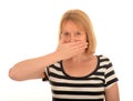 Woman with hand over mouth Royalty Free Stock Photo