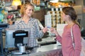 woman hand paying with credit card