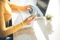 Woman hand phone with keyboard on desk Royalty Free Stock Photo