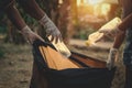 woman hand picking up garbage plastic bottle for cleaning Royalty Free Stock Photo