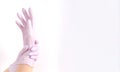 Woman hand in pink glove simple Royalty Free Stock Photo