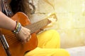 Woman hand playing acoustic guitar, close up on musical instrument Relaxation Music sound hobby passion concept. Music of the Royalty Free Stock Photo