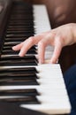 Woman hand playing piano music. Royalty Free Stock Photo