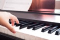 Woman hand playing piano. Music and art background. Back side vi Royalty Free Stock Photo