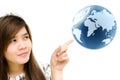 Woman hand pointing earth globe. Royalty Free Stock Photo