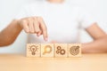 Woman hand pointing magnifying with lightbulb dartboard and Gear icon block. thinking, business planning process, goal, strategy Royalty Free Stock Photo