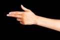 Woman hand pointing to the left with two fingers Royalty Free Stock Photo