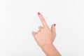 Woman Hand with Polish Fingers on White Background. Shows Sign And Gesture Towards. Touch The Screen Royalty Free Stock Photo