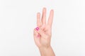 Woman Hand With Polish Nails Show Three Fingers. White Bakcground.