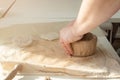 Woman hand potter making clay cup in pottery workshop studio. Process of creating ceramic mug. Handmade, hobby art and Royalty Free Stock Photo