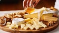 Woman Hand Pouring Honey to Cheese Board Gourmet. Girl Taste French Cheese Board with Brie, Parmesan and Mozzarella Assorted.