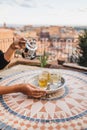 Woman hand pouring traditional moroccan mint tea in glasses. Morocco hospitality Royalty Free Stock Photo