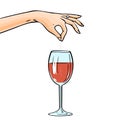 A woman hand pours poison into a glass of wine Royalty Free Stock Photo