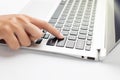 Woman hand press on laptop, close up Royalty Free Stock Photo